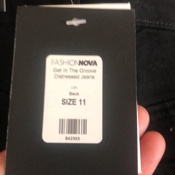 New never wore jeans. All black with little holes. - Picture 5 of 5